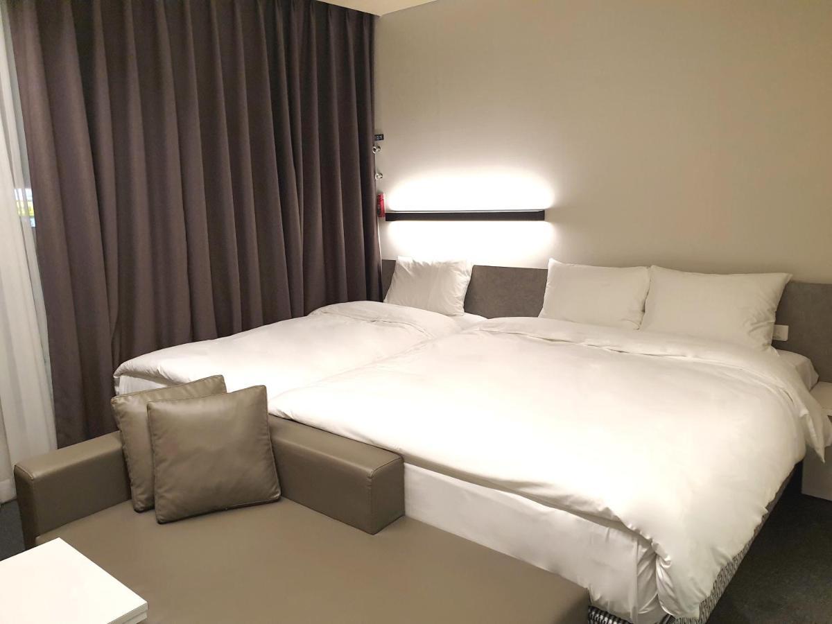 Grand City Hotel Cshangvon Kültér fotó