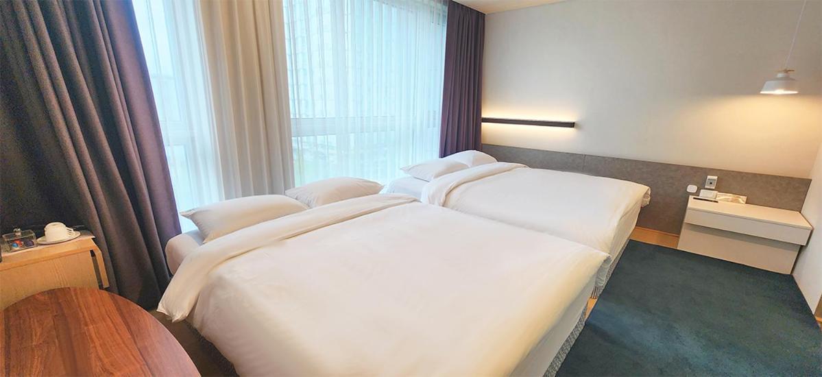 Grand City Hotel Cshangvon Kültér fotó