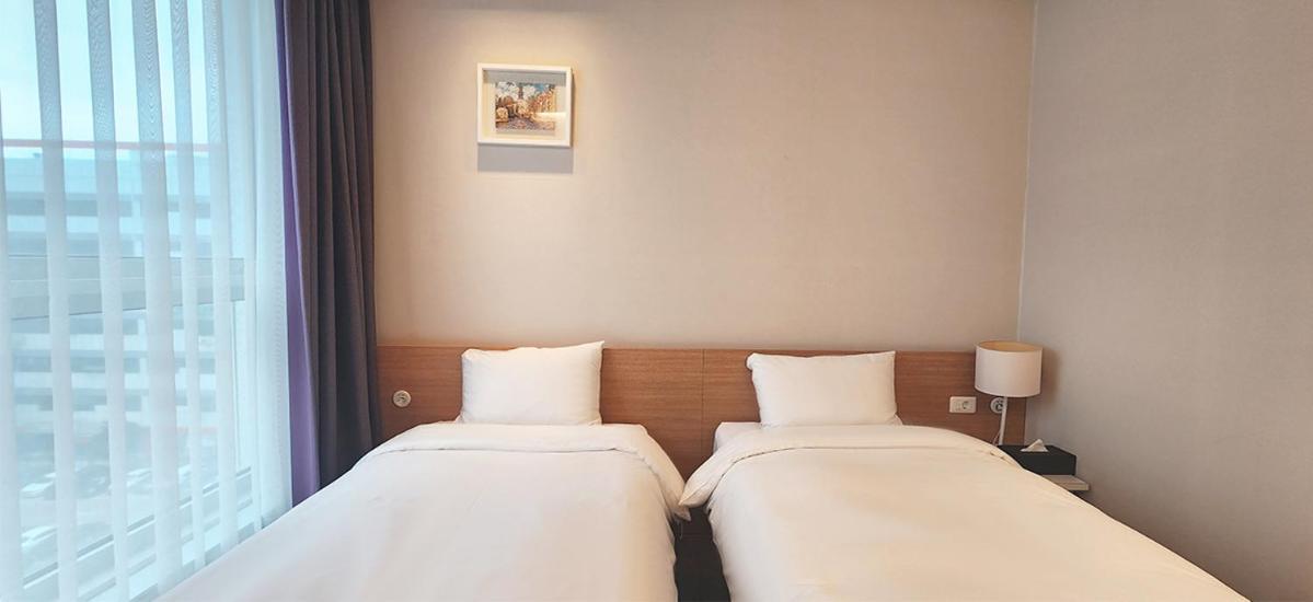 Grand City Hotel Cshangvon Kültér fotó