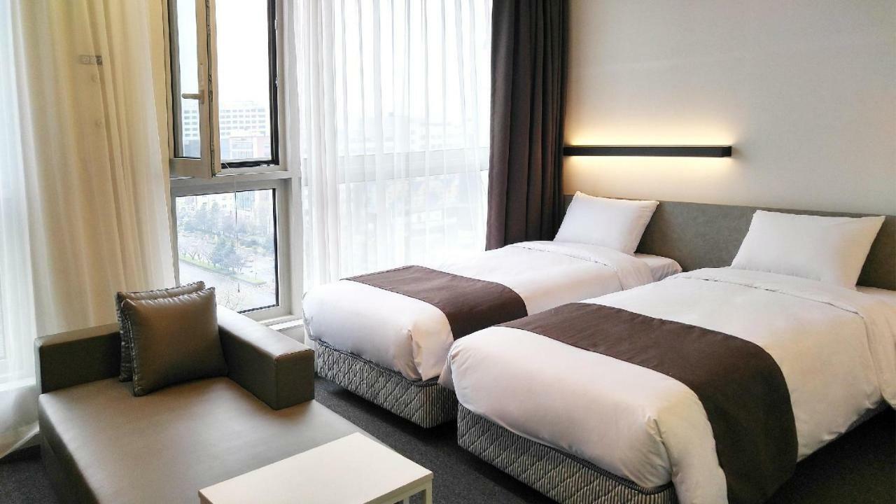 Grand City Hotel Cshangvon Kültér fotó